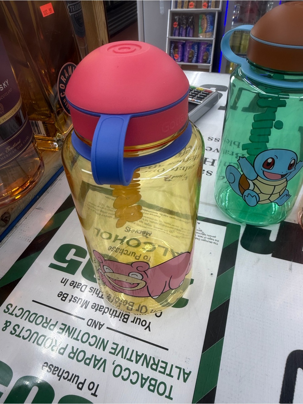 Pokemon Pink & Yellow Slowpoke Water Bottle with Blue Handle